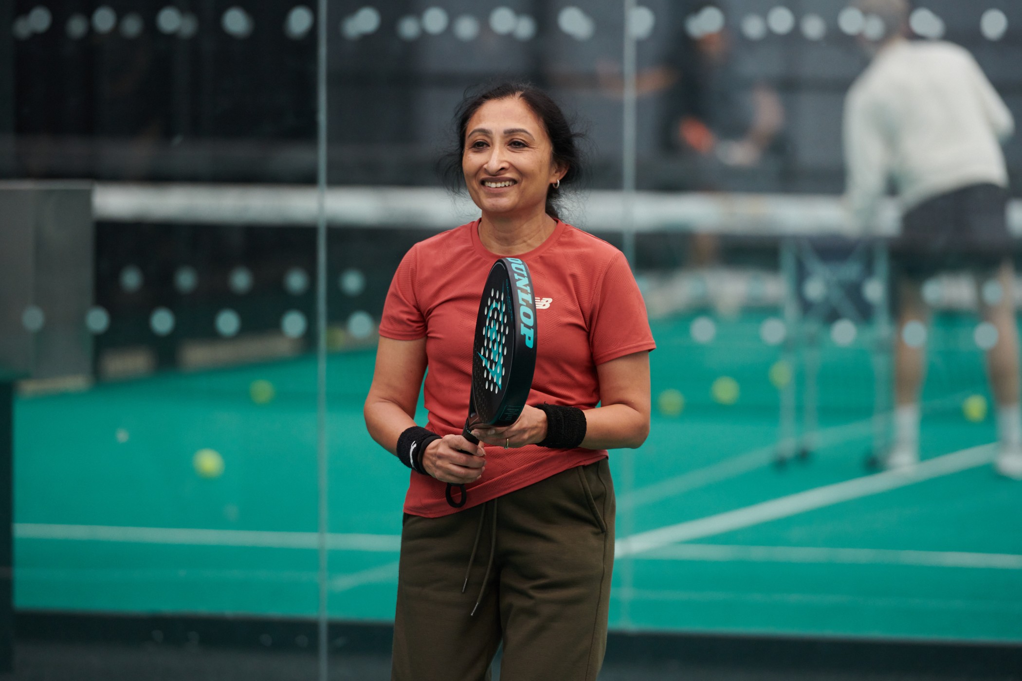 woman-on-padel-court.jpg